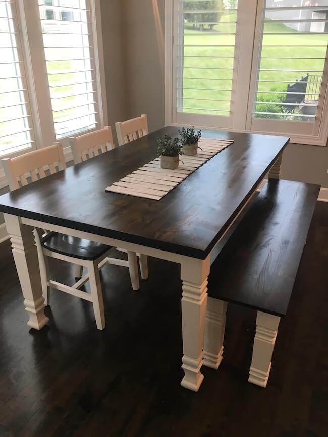 white dining table with brown top